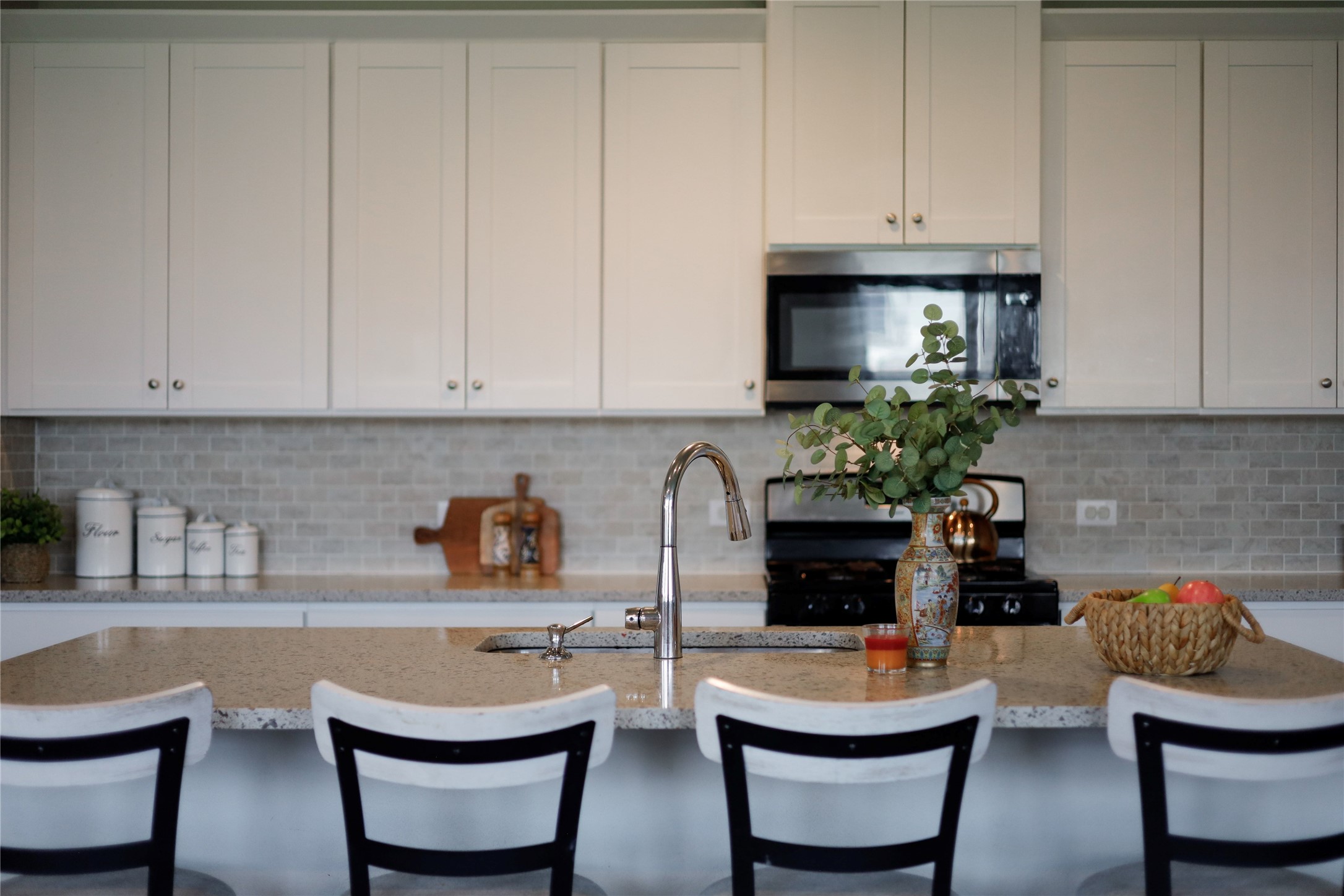 7404 Albany Drive Austin, TX 78754 - Photo 12 of 40 The oversized island is perfect for gathering and entertaining conversations.