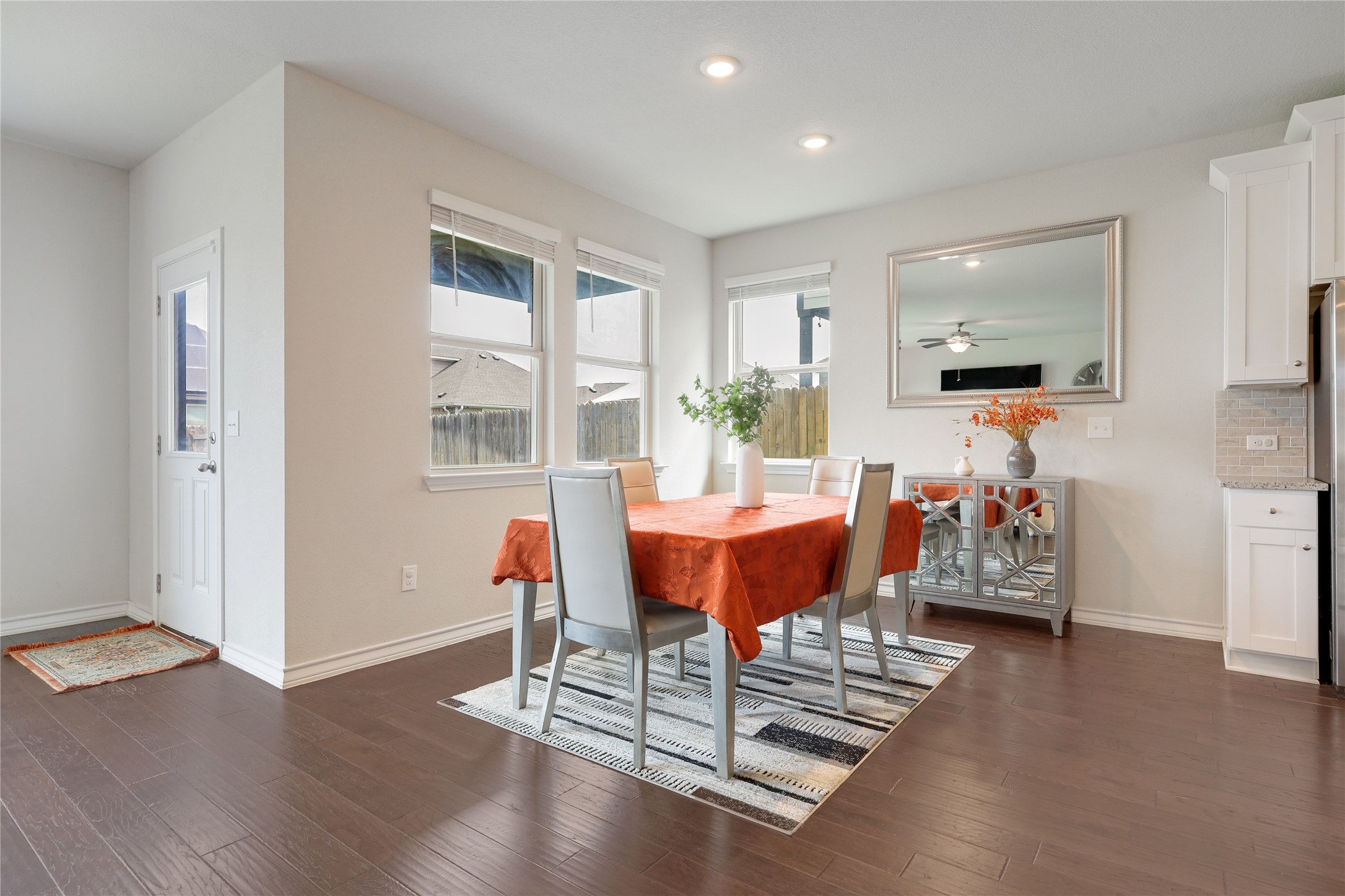 7404 Albany Drive Austin, TX 78754 - Photo 16 of 40 Spacious dining area along windows overlooking the backyard.