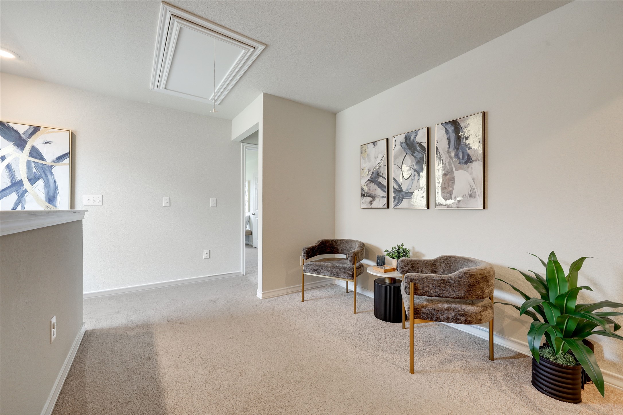 7404 Albany Drive Austin, TX 78754 - Photo 24 of 40 The bonus living area separates the primary suite from the secondary bedroom hallway for privacy.
