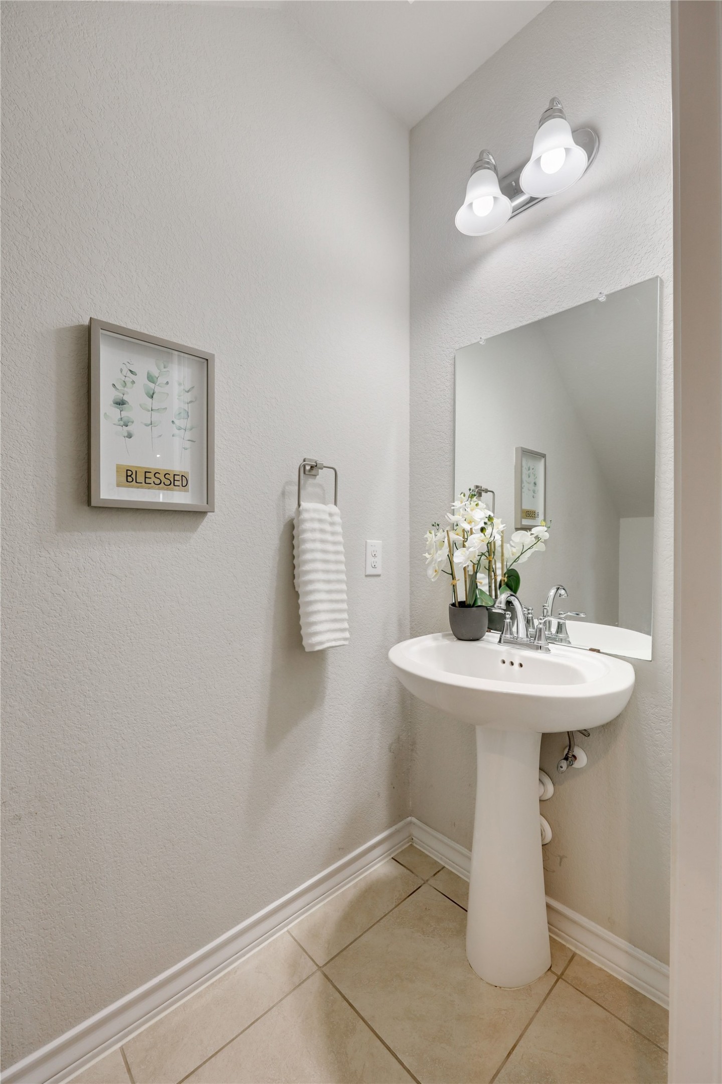 7404 Albany Drive Austin, TX 78754 - Photo 30 of 40 There's also a well appointed main floor guest powder room.
