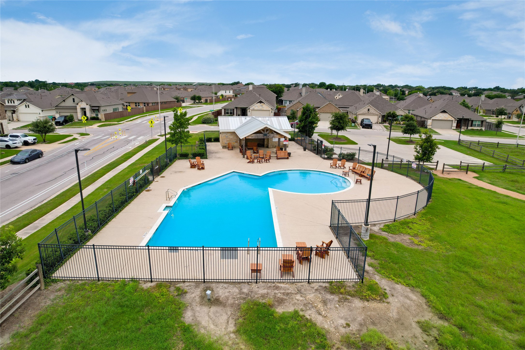 7404 Albany Drive Austin, TX 78754 - Photo 38 of 40 Enjoy refreshing dips in the HOA pool throughout the summer season.
