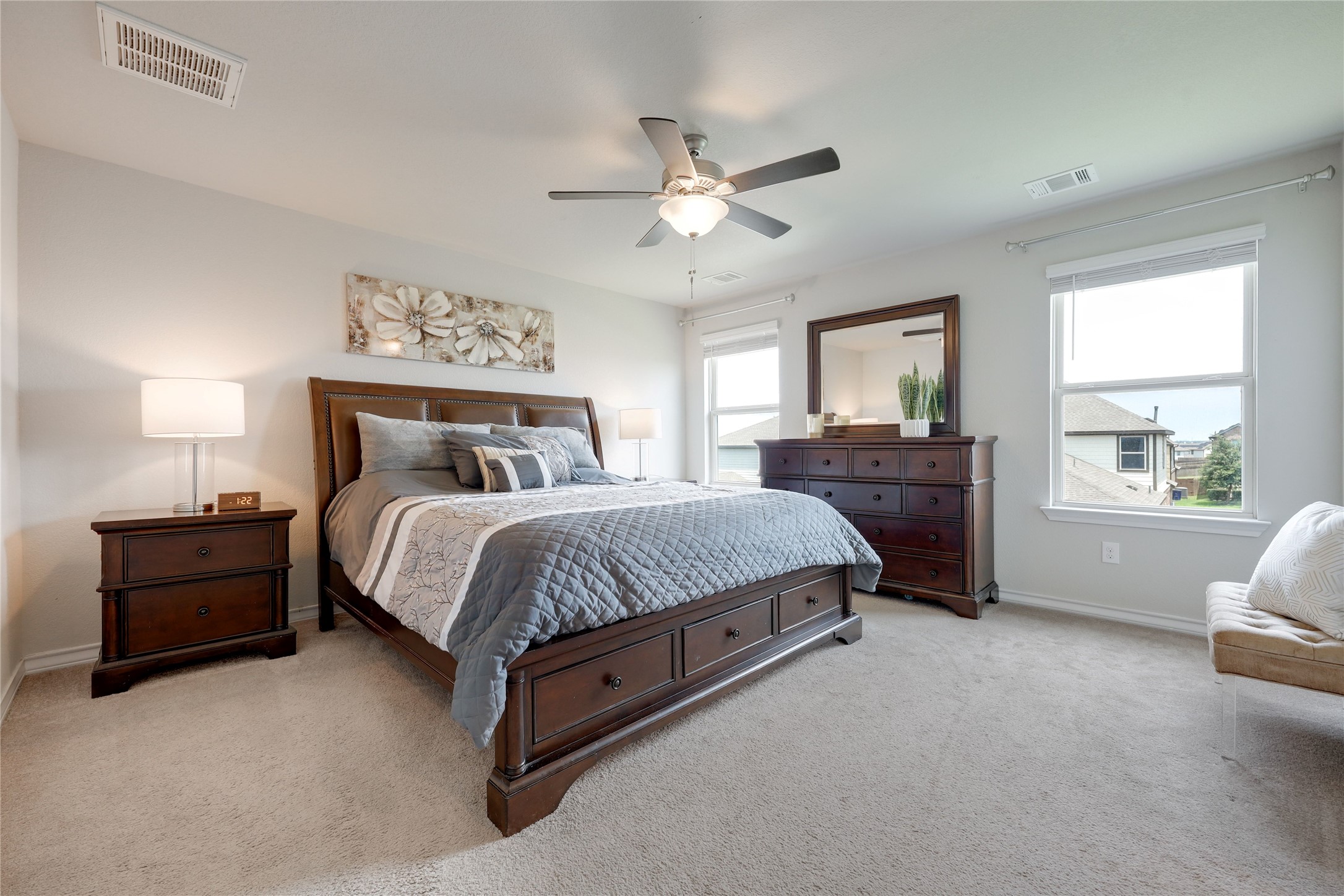 7404 Albany Drive Austin, TX 78754 - Photo 3 of 40 Upstairs you will find four spacious bedrooms including this oversized primary suite complete with its own ensuite bath.