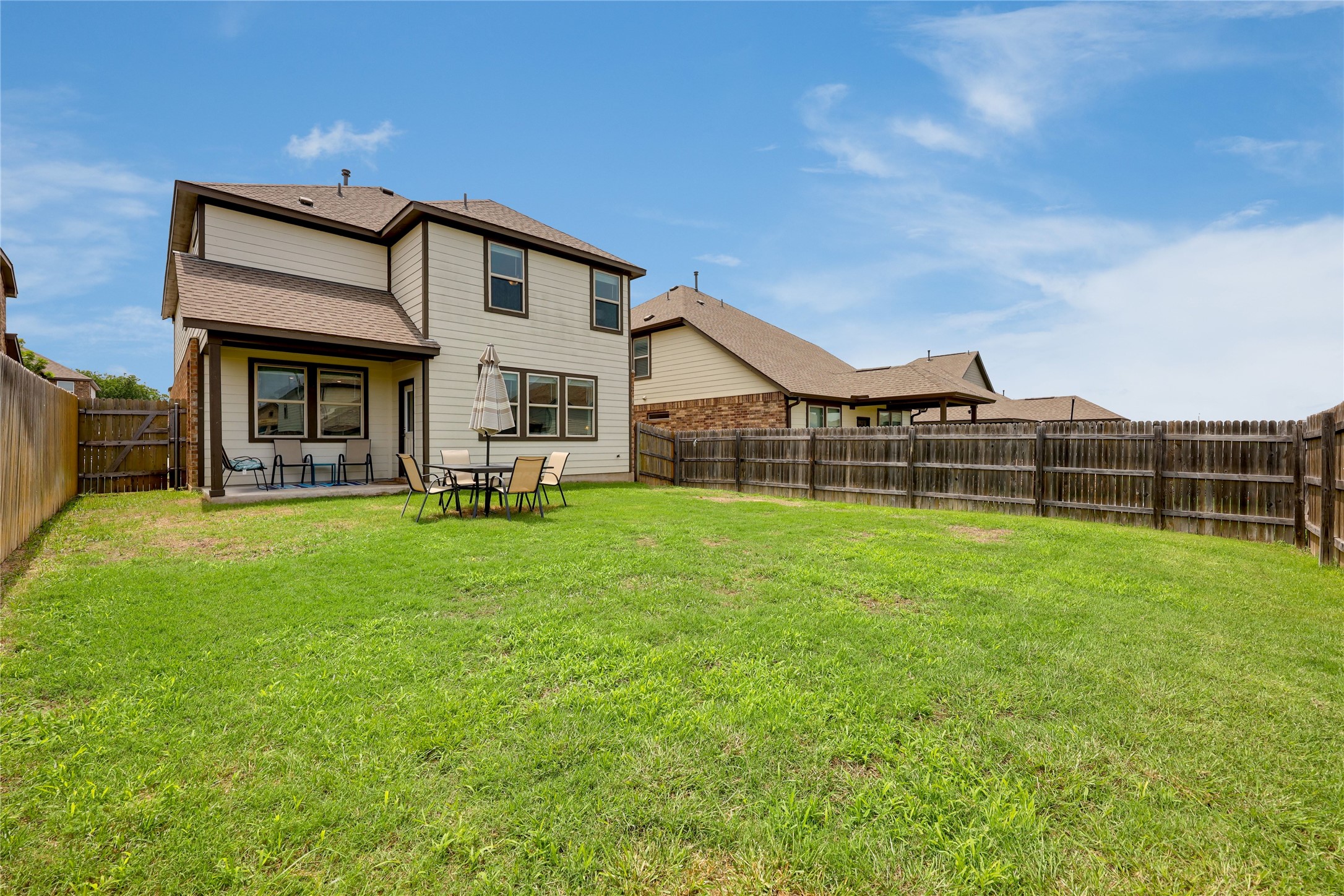 7404 Albany Drive Austin, TX 78754 - Photo 4 of 40 Enjoy your own private fenced-in backyard with a covered back porch and irrigated lawn.