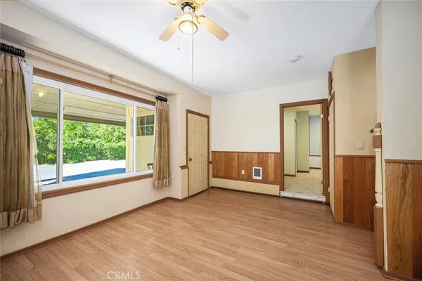 a view of a livingroom with wooden floor