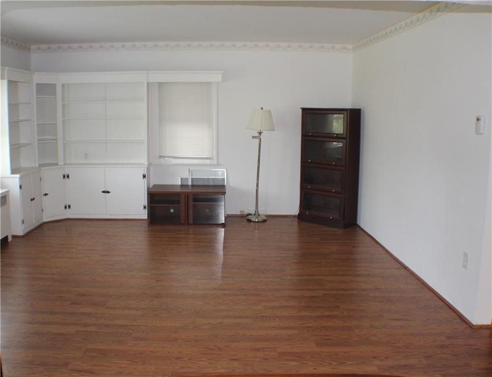 154 Bellevue Road Pittsburgh, PA 15229 - Photo 8 of 25 Living room has a solid wall to mount you big screen TV.