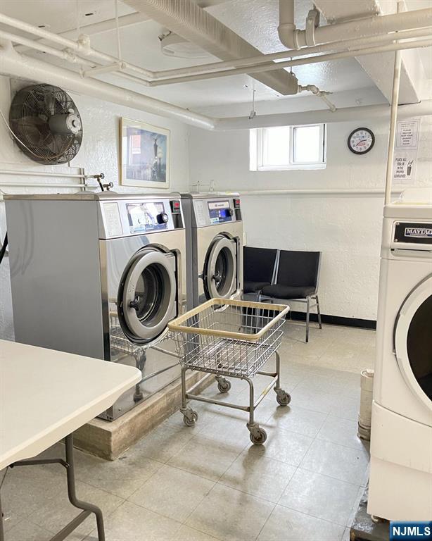 2205 North Central Road, Unit 3D Fort Lee, NJ 07024 - Photo 26 of 29 a view of a kitchen with washer and dryer