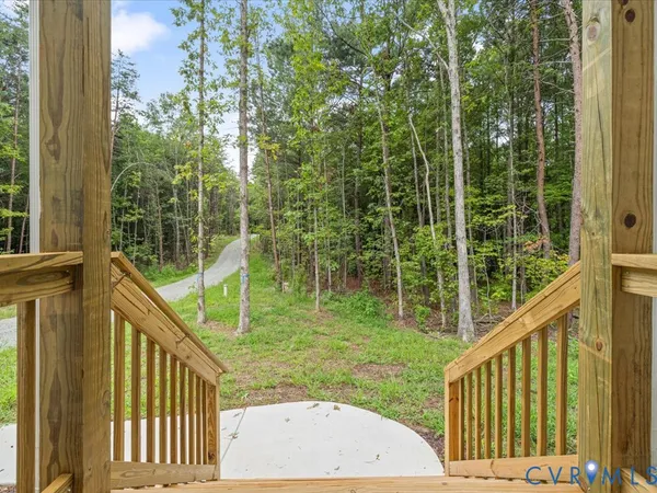 a view of balcony with yard