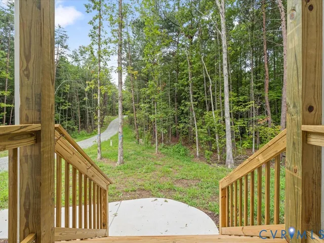a view of balcony with yard