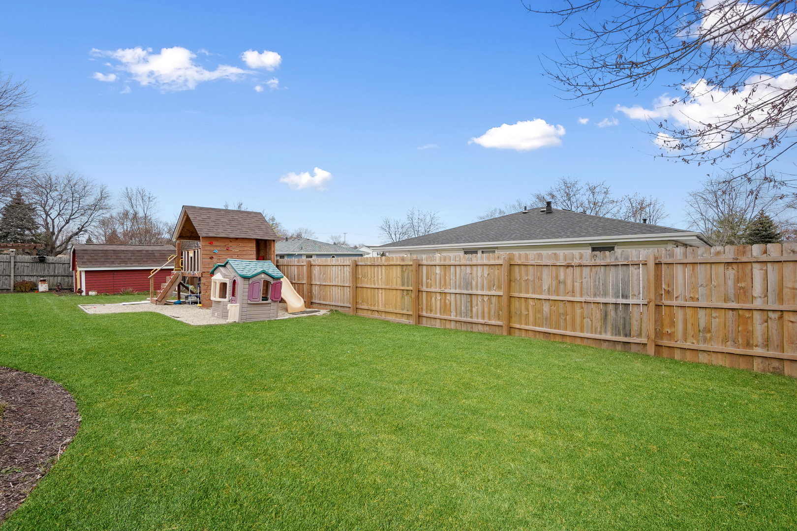1014 Southgate Road New Lenox, IL 60451 - Photo 18 of 18 a view of a backyard with a garden and entertaining space