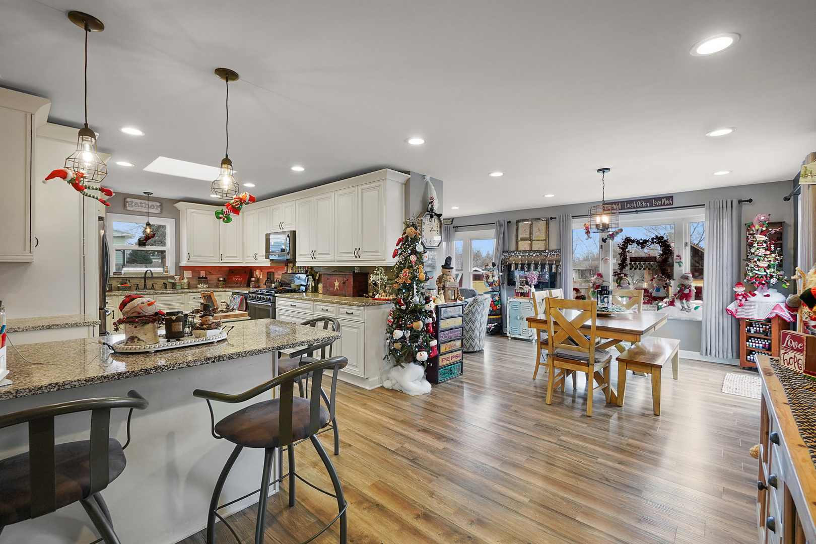 1014 Southgate Road New Lenox, IL 60451 - Photo 3 of 18 a view of a dining area with furniture and wooden floor
