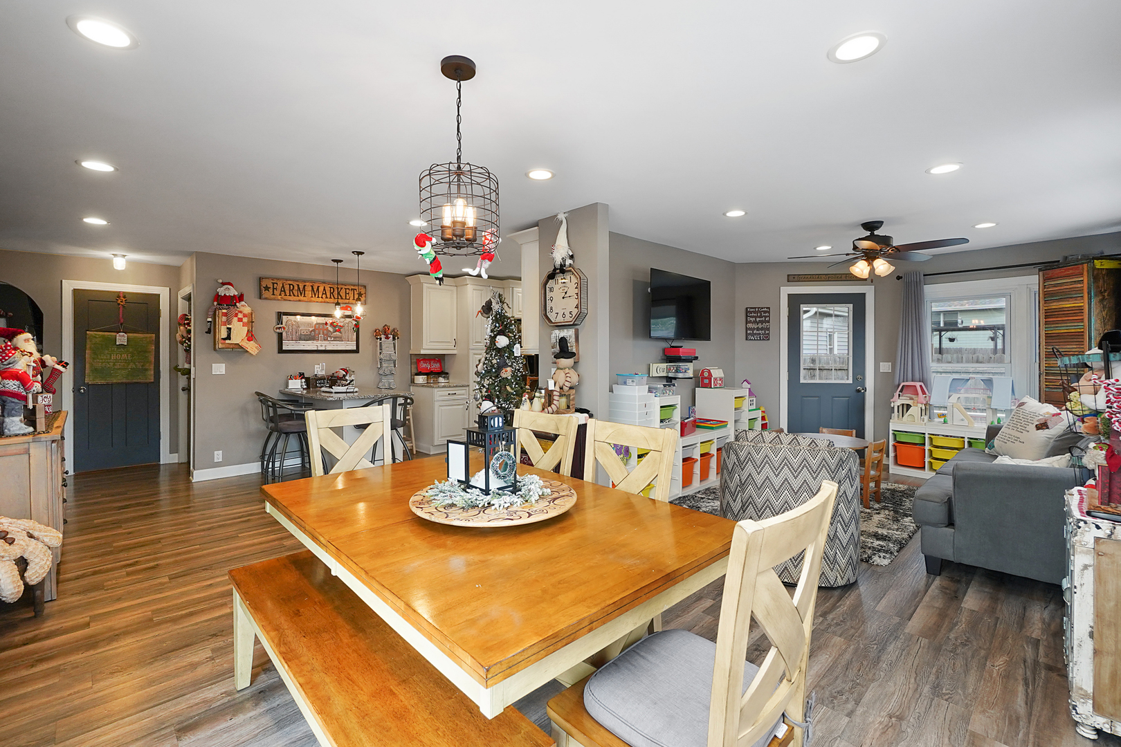 1014 Southgate Road New Lenox, IL 60451 - Photo 5 of 18 a view of a dining room and livingroom with furniture wooden floor a chandelier