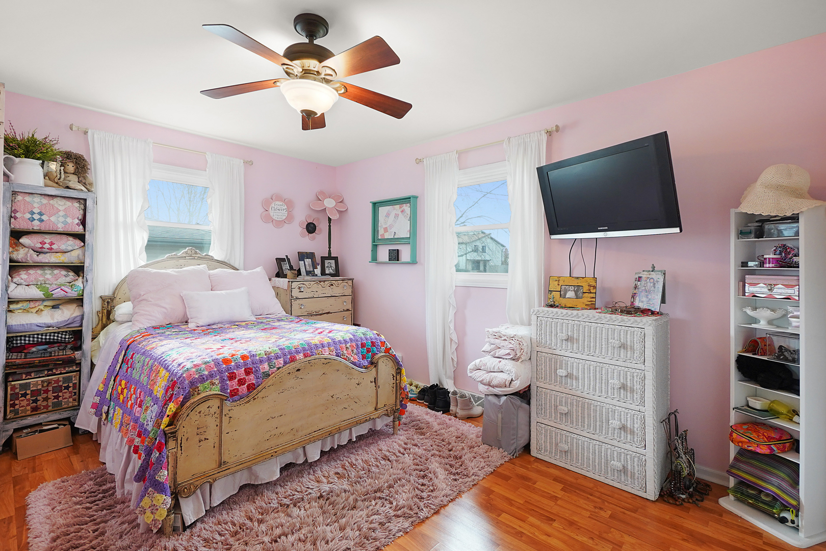 1014 Southgate Road New Lenox, IL 60451 - Photo 9 of 18 a bedroom with a bed and a flat screen tv