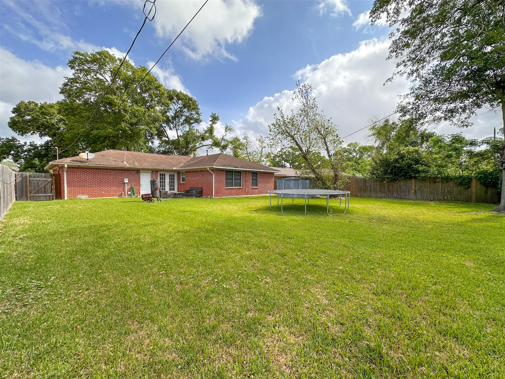 720 Northridge Street Angleton, TX 77515 - Photo 12 of 12 a view of a house with a yard