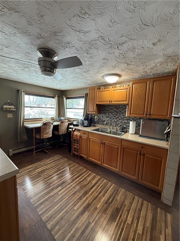 2964 McIntyre Road McIntyre, PA 15756 - Photo 18 of 29 a kitchen with stainless steel appliances wooden cabinets sink and stove