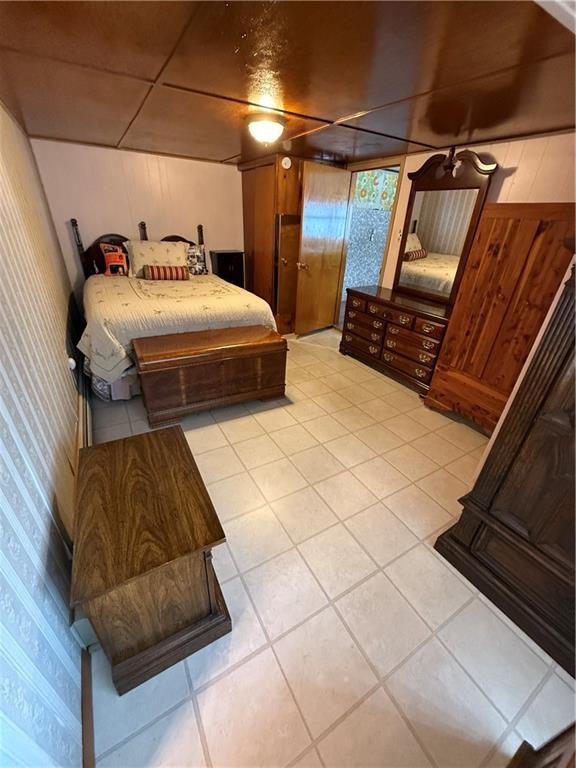 2964 McIntyre Road McIntyre, PA 15756 - Photo 19 of 29 a bedroom with double bed and a couch