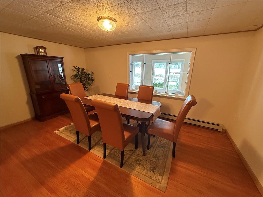 2964 McIntyre Road McIntyre, PA 15756 - Photo 10 of 29 a view of a dining room with furniture window and wooden floor