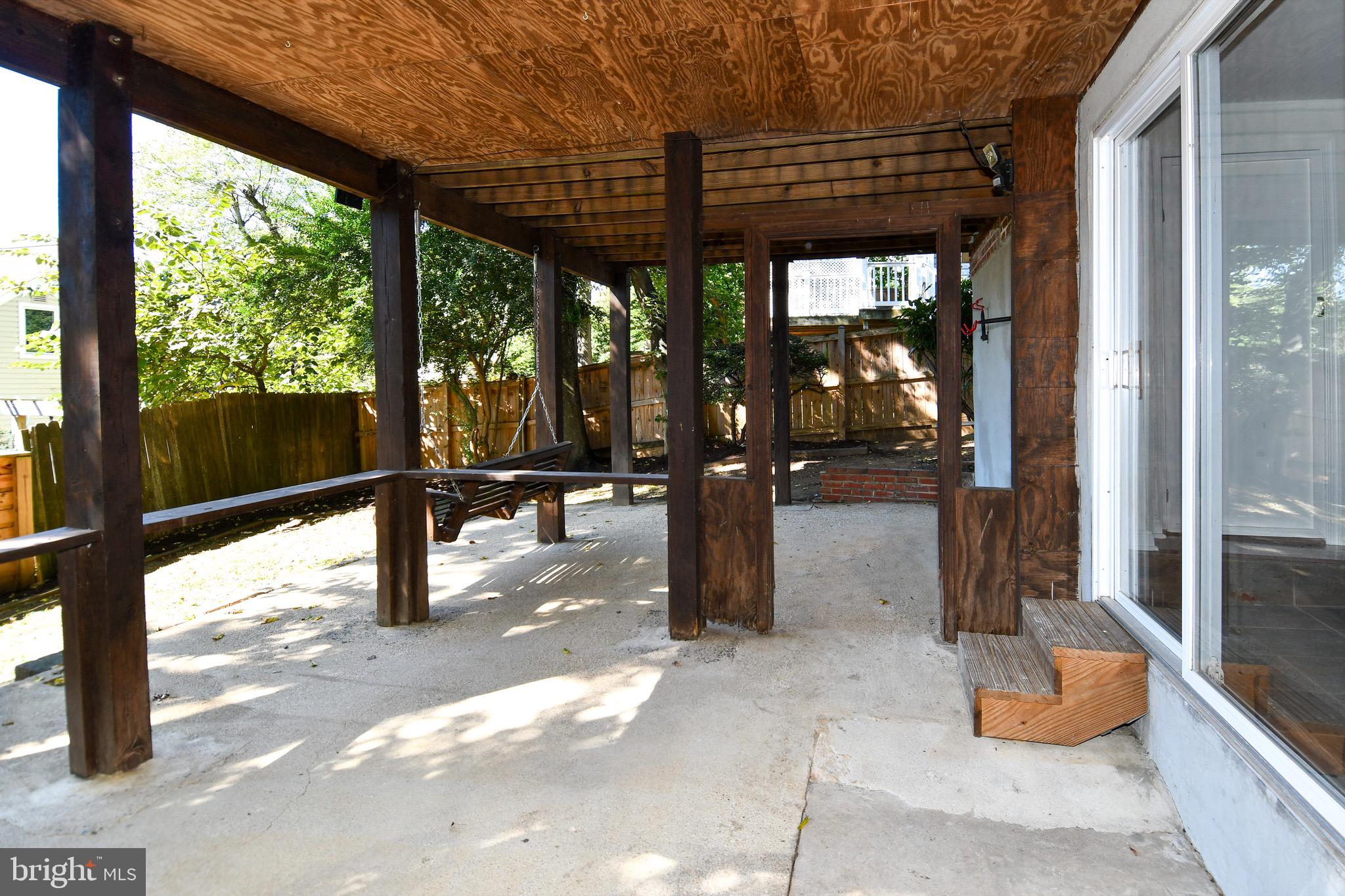 2100 South Quebec Street Arlington, VA 22204 - Photo 33 of 36 a view of a porch with wooden floor