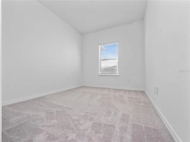 a bathroom with a sink toilet vanity and shower
