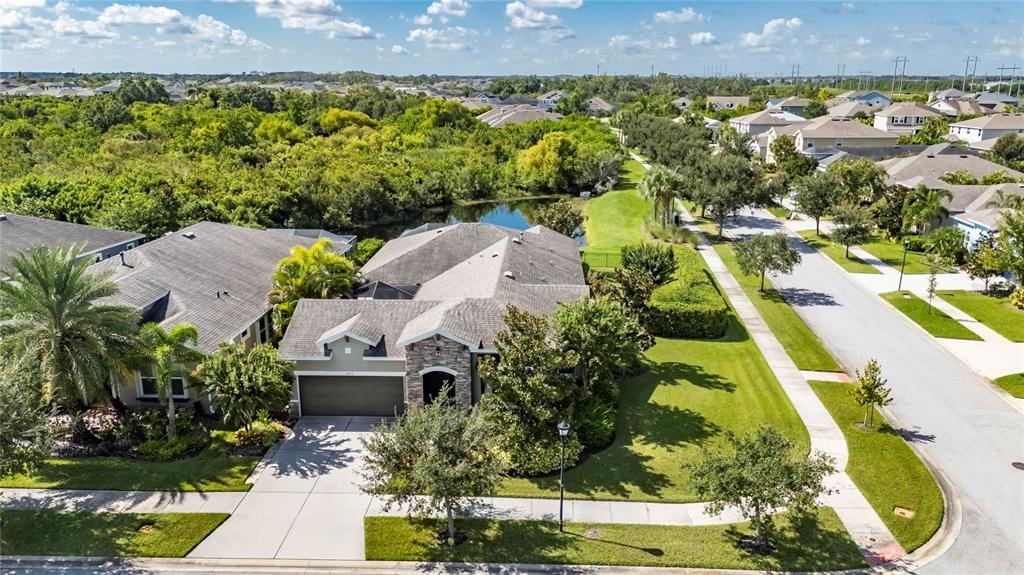 an aerial view of a house with a garden