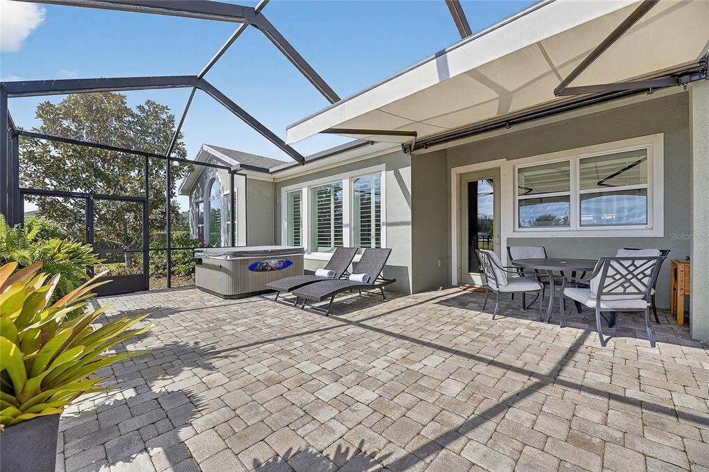 6903 Crestpoint Drive Apollo Beach, FL 33572 - Photo 3 of 95 a outdoor space with lots of furniture and windows