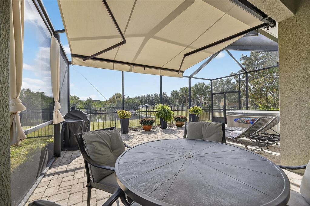 6903 Crestpoint Drive Apollo Beach, FL 33572 - Photo 56 of 95 a view of chair and tables in the balcony