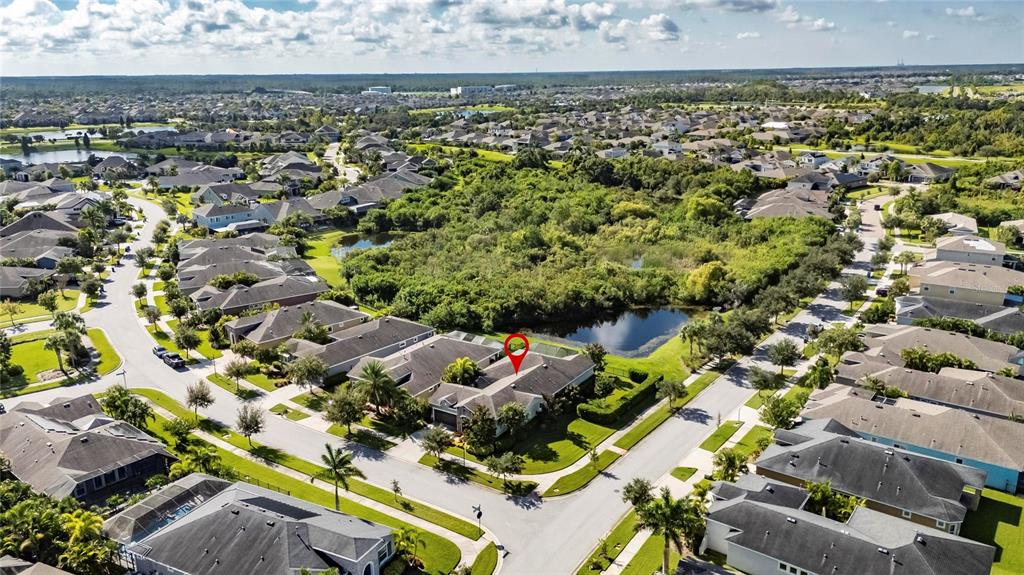 6903 Crestpoint Drive Apollo Beach, FL 33572 - Photo 73 of 95 an aerial view of residential houses with outdoor space