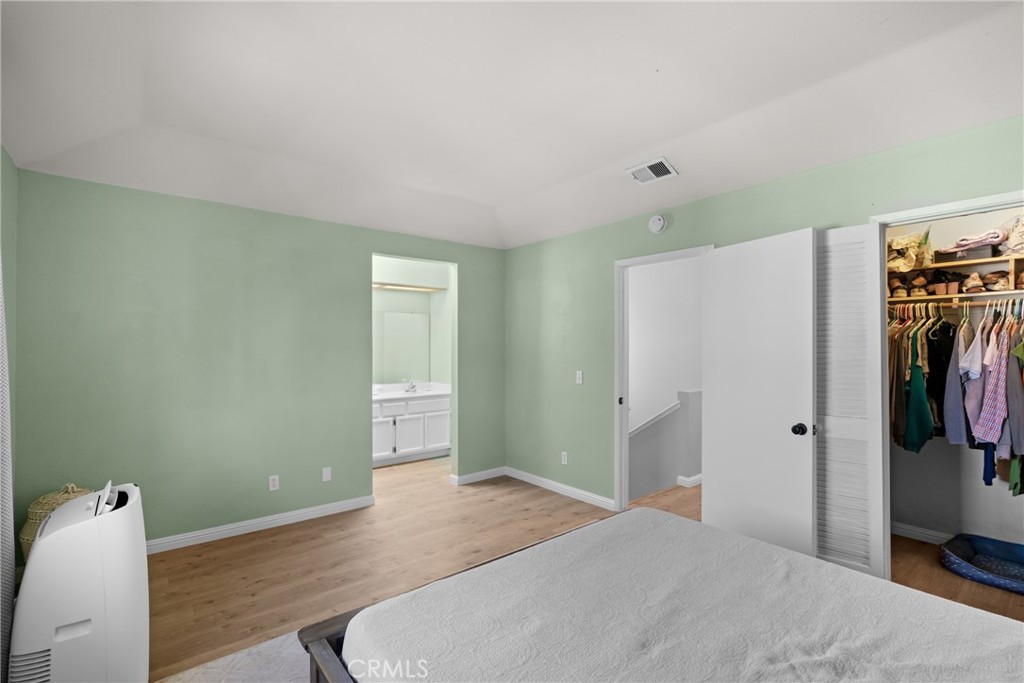 4239 Shadowcrest Drive Santa Maria, CA 93455 - Photo 22 of 33 a bedroom with a bed and a flat screen tv