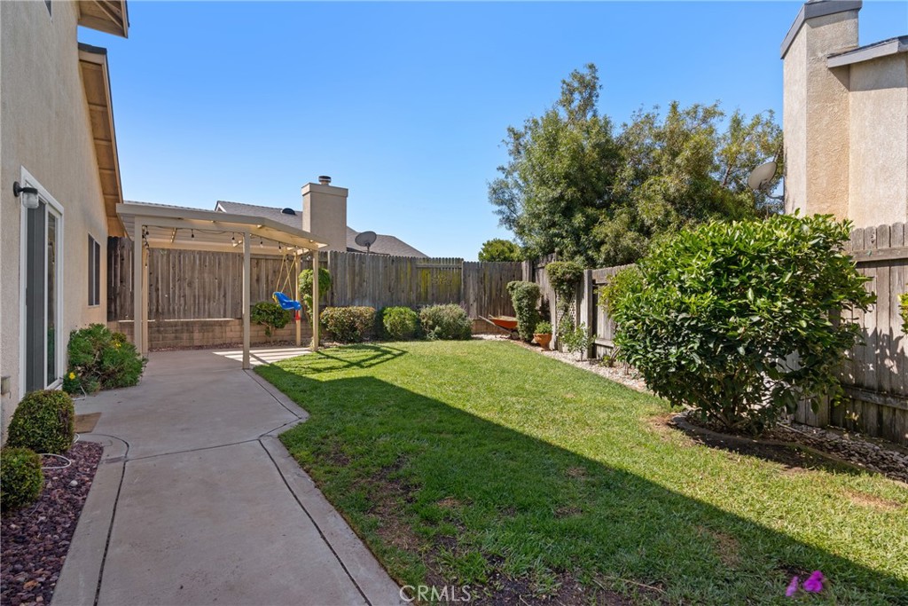 4239 Shadowcrest Drive Santa Maria, CA 93455 - Photo 26 of 33 a view of a garden with a building in the background