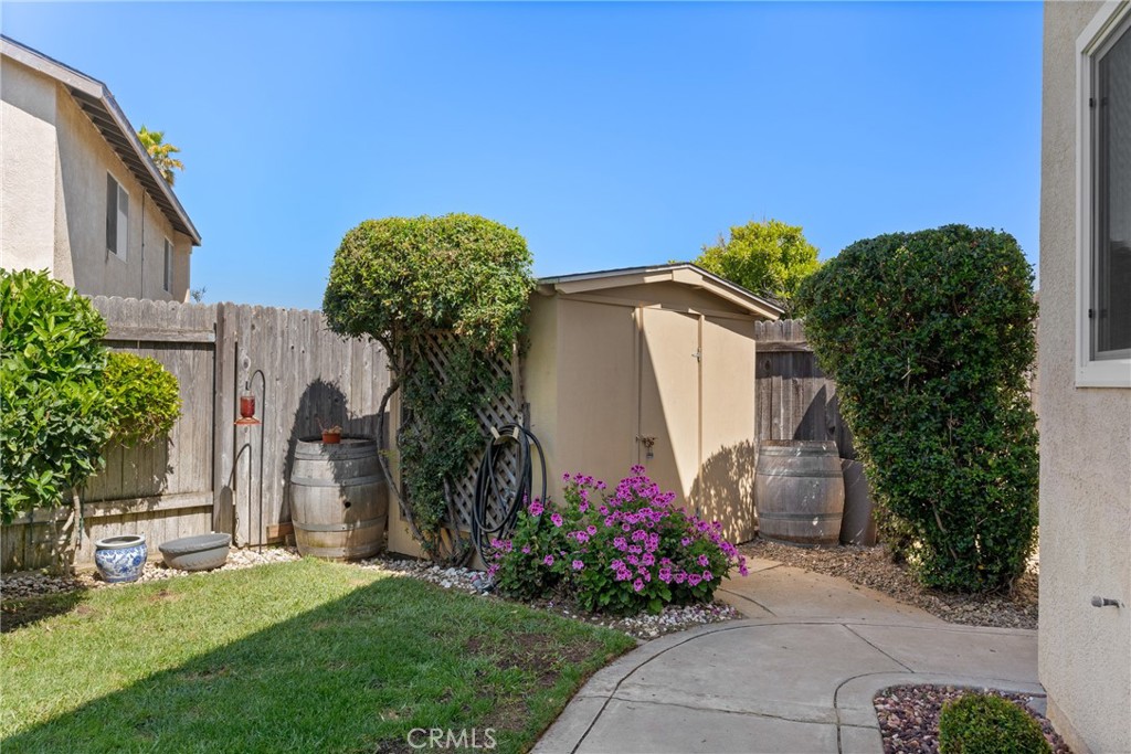 4239 Shadowcrest Drive Santa Maria, CA 93455 - Photo 28 of 33 a front view of a house with garden