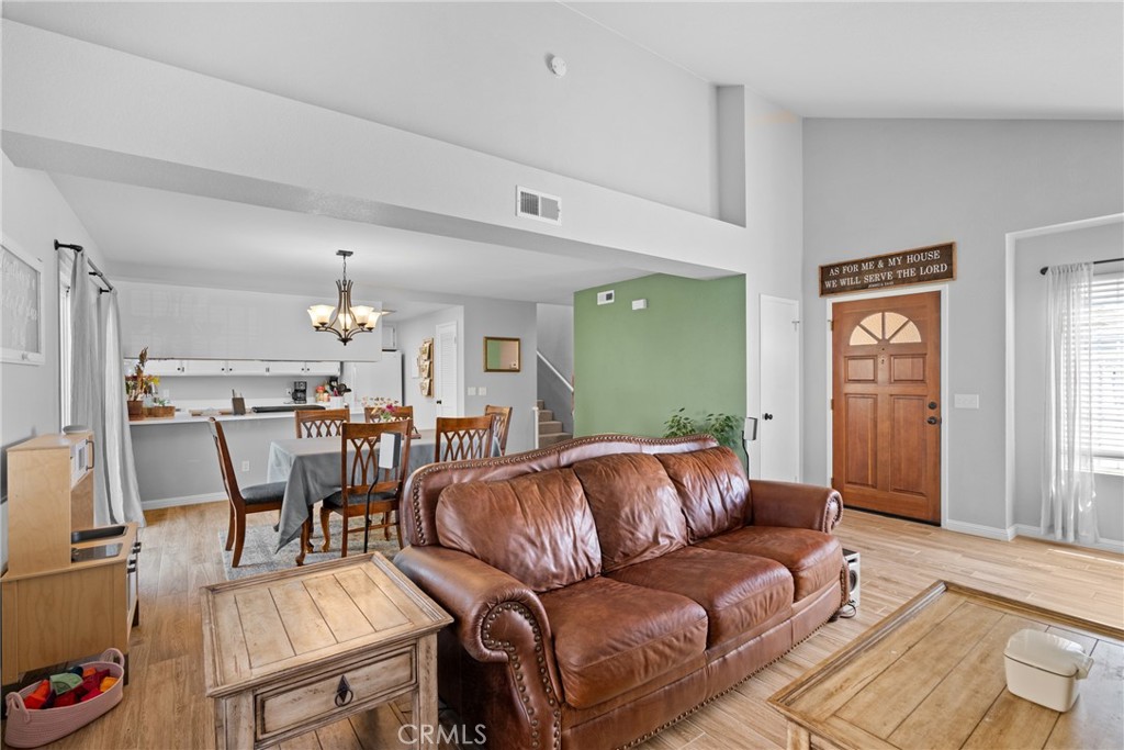 4239 Shadowcrest Drive Santa Maria, CA 93455 - Photo 6 of 33 a living room with furniture and a wooden floor