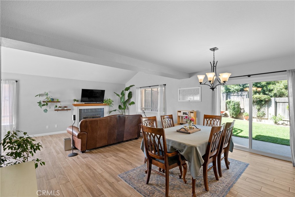 4239 Shadowcrest Drive Santa Maria, CA 93455 - Photo 7 of 33 a view of a dining room with furniture window and wooden floor
