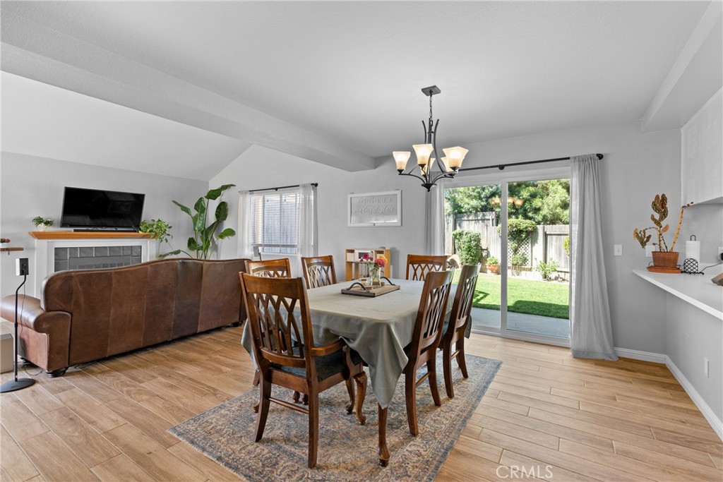 4239 Shadowcrest Drive Santa Maria, CA 93455 - Photo 8 of 33 a view of a dining room with furniture window and wooden floor
