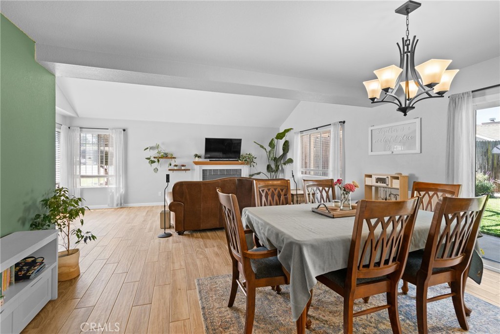 4239 Shadowcrest Drive Santa Maria, CA 93455 - Photo 10 of 33 a view of a dining room with furniture and wooden floor