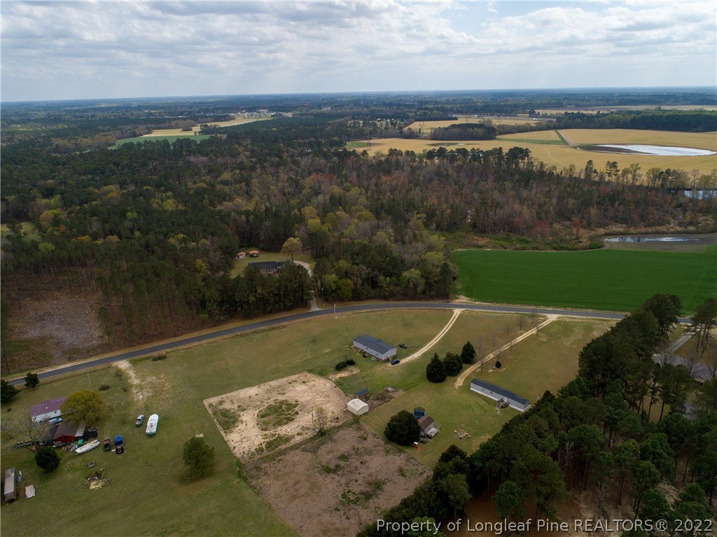 Tbd J T Matthews Road Godwin, NC 28344 - Photo 2 of 14 a view of a lake with a mountain