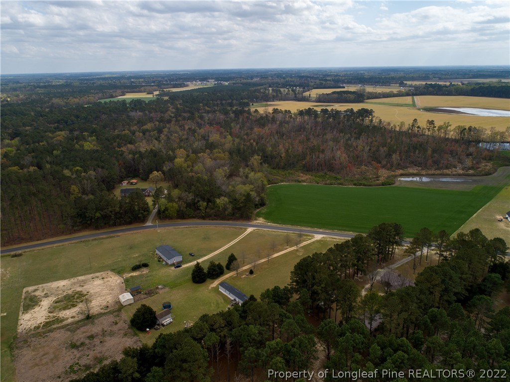Tbd J T Matthews Road Godwin, NC 28344 - Photo 3 of 14 a view of a lake with a yard