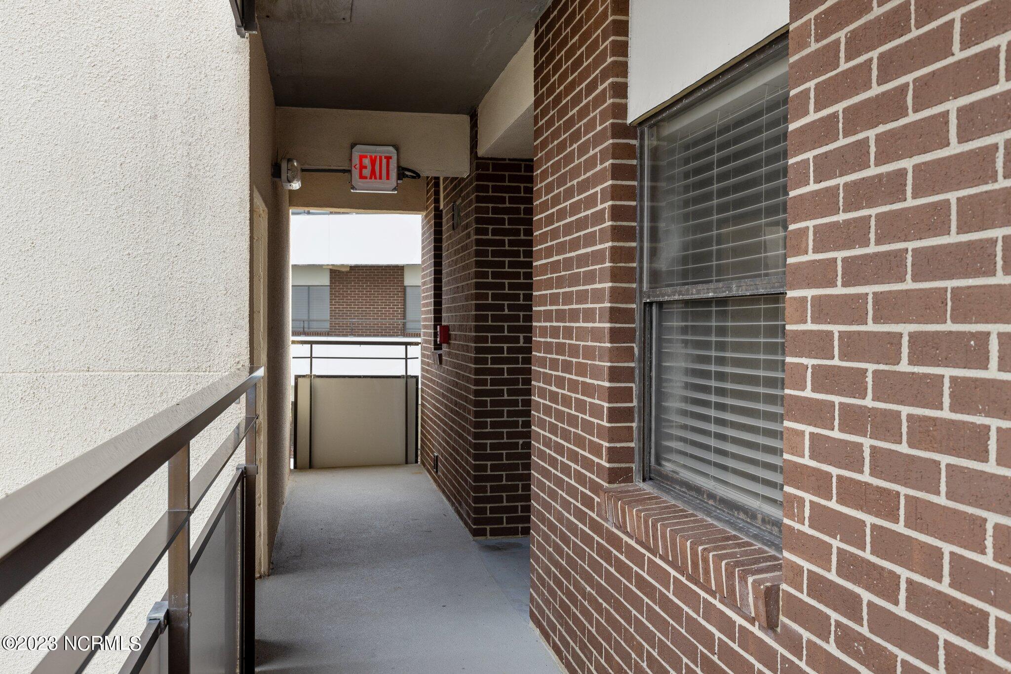 1505 Salter Path Road, Unit 442 Indian Beach, NC 28512 - Photo 37 of 77 Walkway to condo