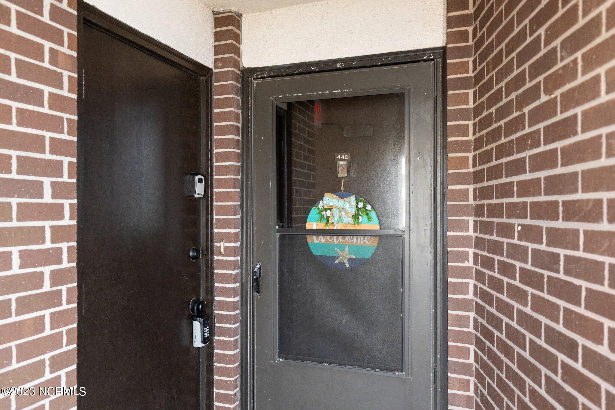 1505 Salter Path Road, Unit 442 Indian Beach, NC 28512 - Photo 4 of 77 Front door