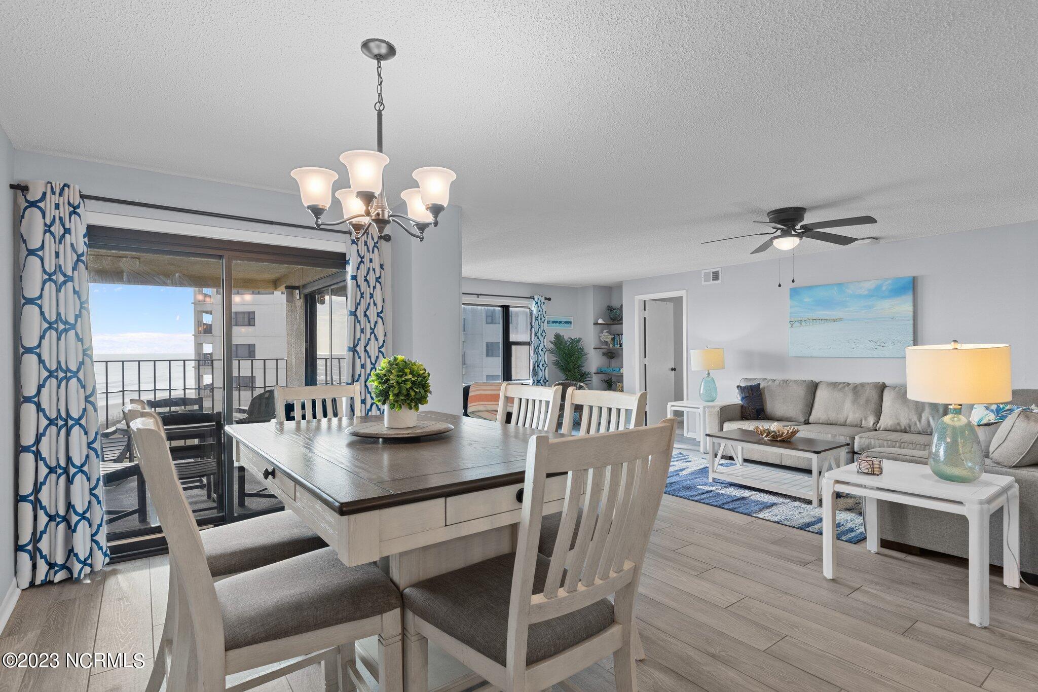 1505 Salter Path Road, Unit 442 Indian Beach, NC 28512 - Photo 7 of 77 Open dining/living area