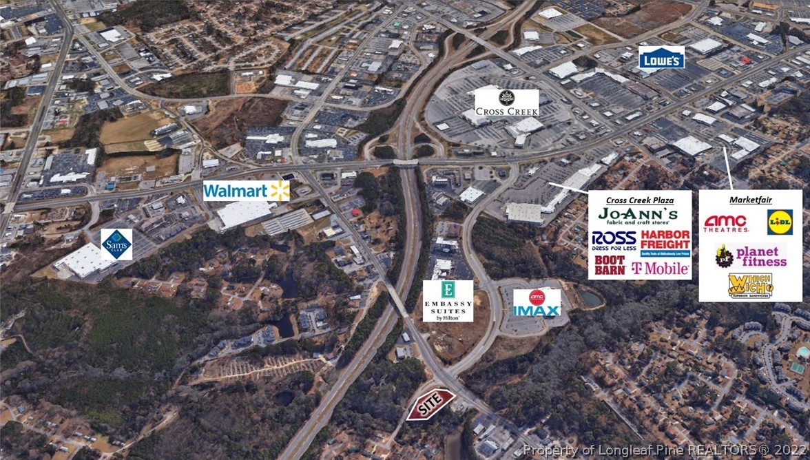 5020 Yadkin Road Fayetteville, NC 28303 - Photo 2 of 4 a sign that is on a tree