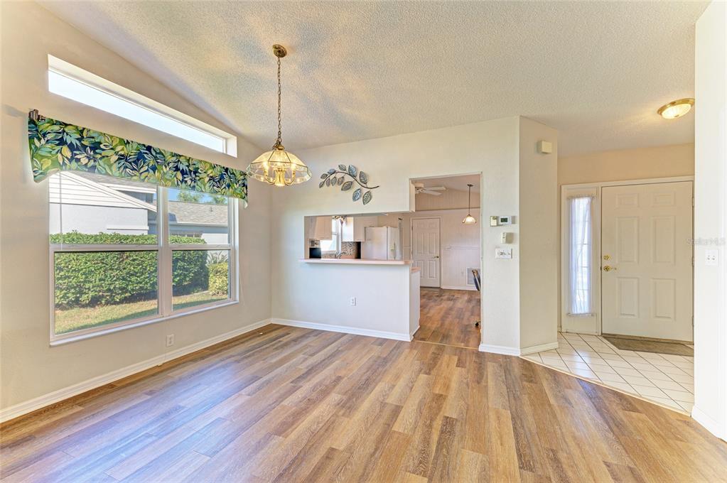919 Spring Lakes Boulevard Bradenton, FL 34210 - Photo 15 of 43 a view of a room with wooden floor and a window