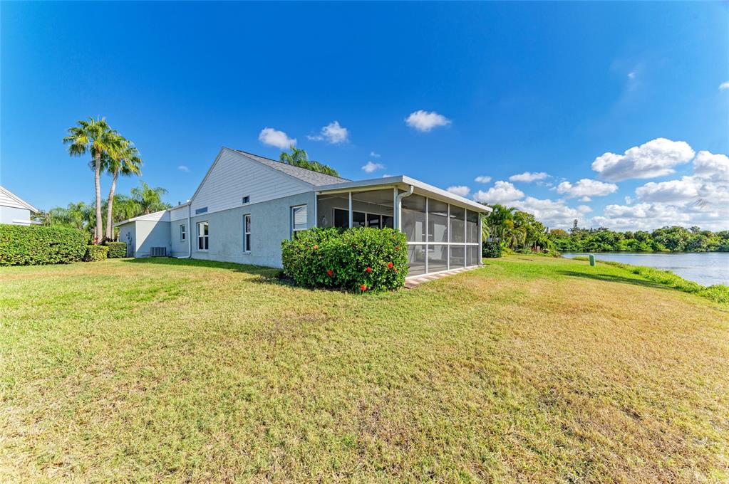 919 Spring Lakes Boulevard Bradenton, FL 34210 - Photo 40 of 43 a house view with a garden space