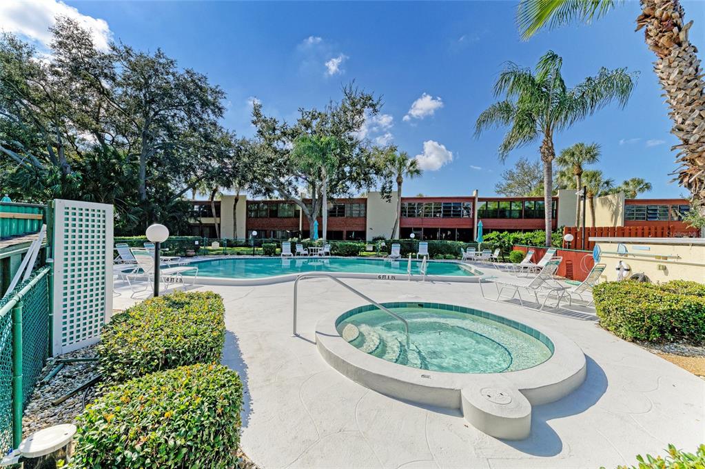 919 Spring Lakes Boulevard Bradenton, FL 34210 - Photo 43 of 43 a view of a swimming pool with a patio