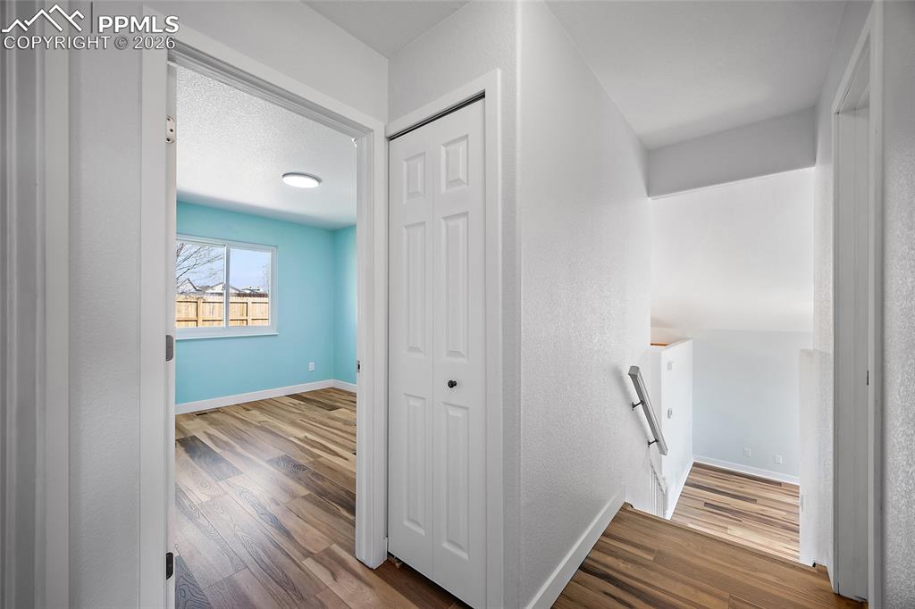 4923 Brant Road Colorado Springs, CO 80911 - Photo 9 of 25 Hallway to bedrooms