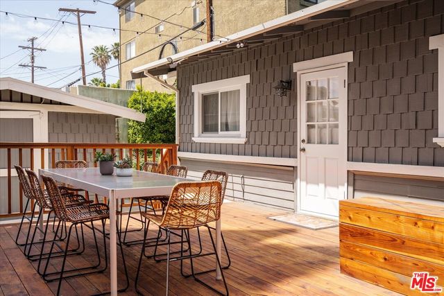 a backyard of a house with lots of green space and fountain view