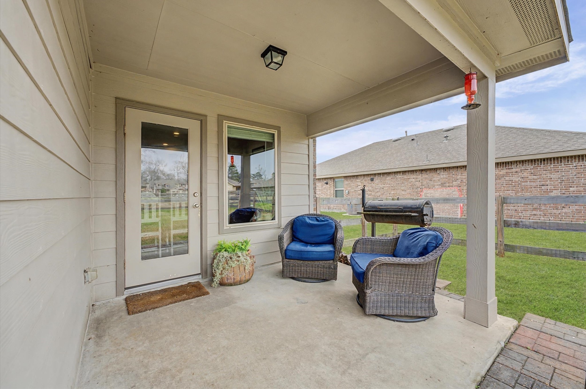 222 Kickapoo Drive Anahuac, TX 77514 - Photo 6 of 17 a balcony with furniture and a garden