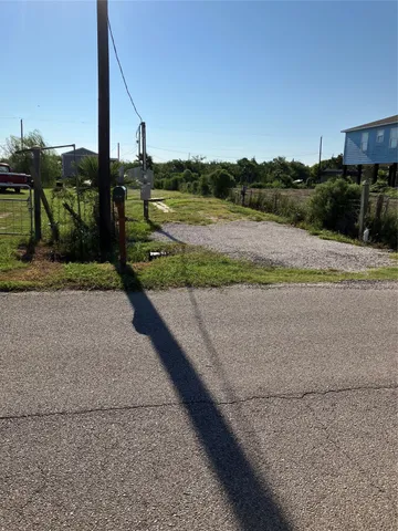 a view of a lake with a big yard