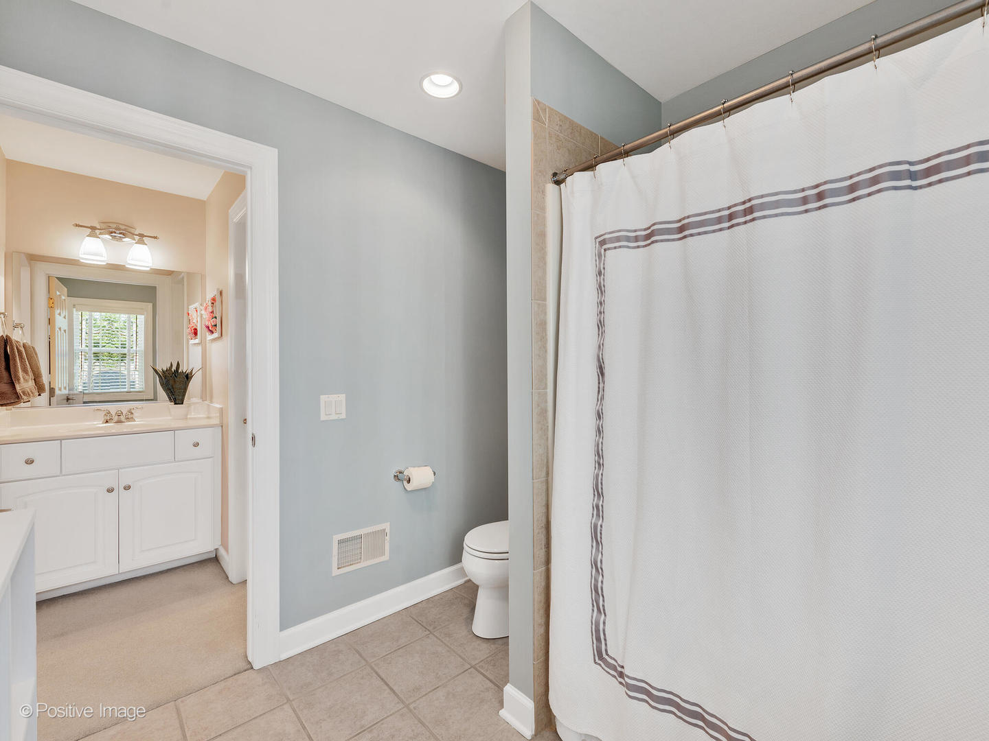 822 Ranch Road Wheaton, IL 60187 - Photo 21 of 36 a bathroom with a granite countertop sink toilet and shower