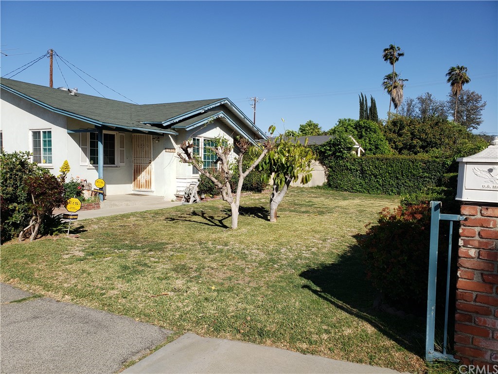 11929 Ranchito Street El Monte, CA 91732 - Photo 11 of 28 a backyard of a house with table and chairs