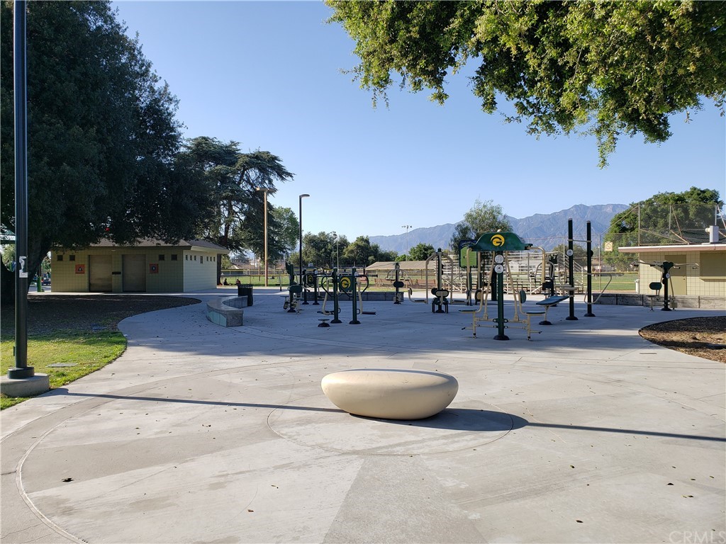 11929 Ranchito Street El Monte, CA 91732 - Photo 28 of 28 a swimming pool with outdoor seating and covered with trees