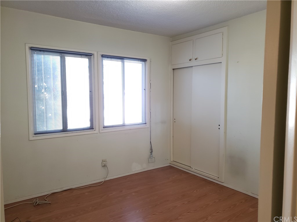 11929 Ranchito Street El Monte, CA 91732 - Photo 7 of 28 an empty room with a window